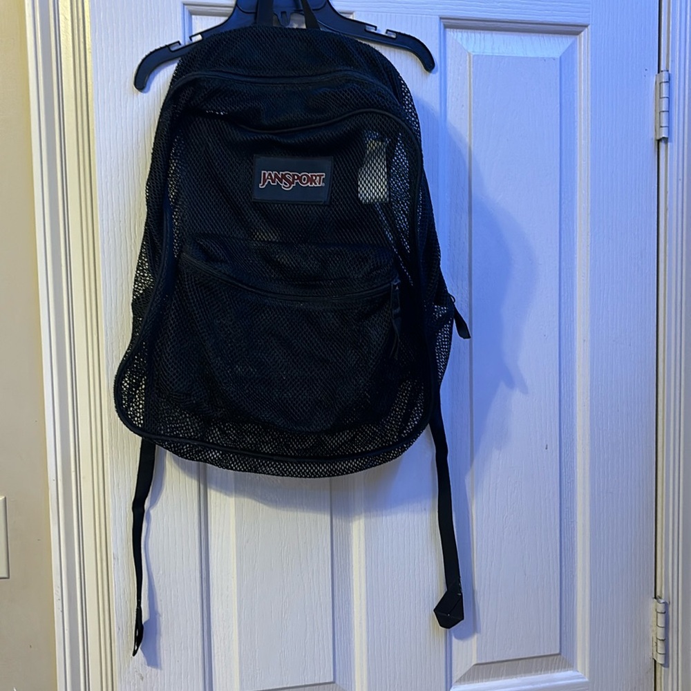 Black Jansport Mesh back pack
